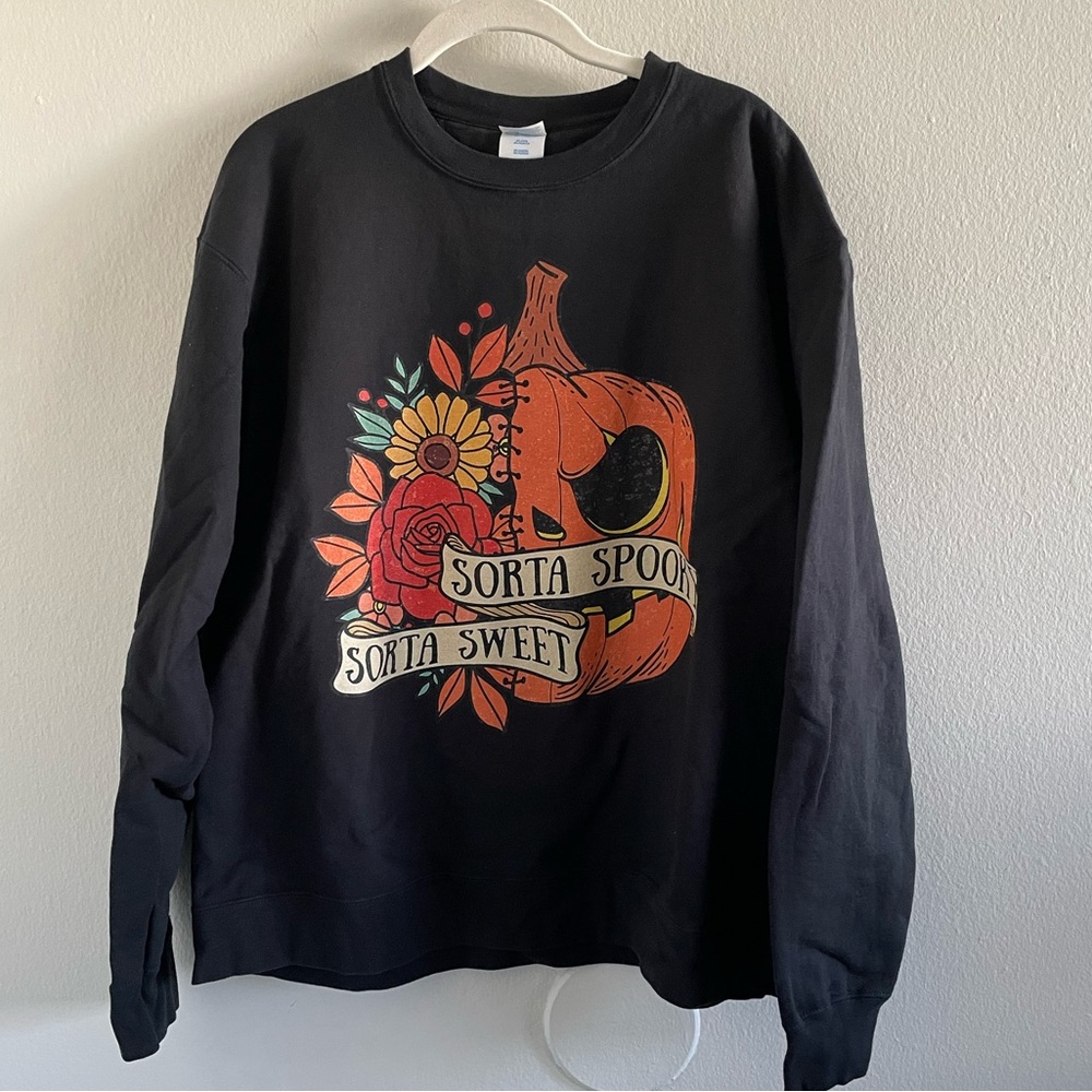 Slightly sweet slightly spooky unisex sweatshirt. Size XL. NWOT.